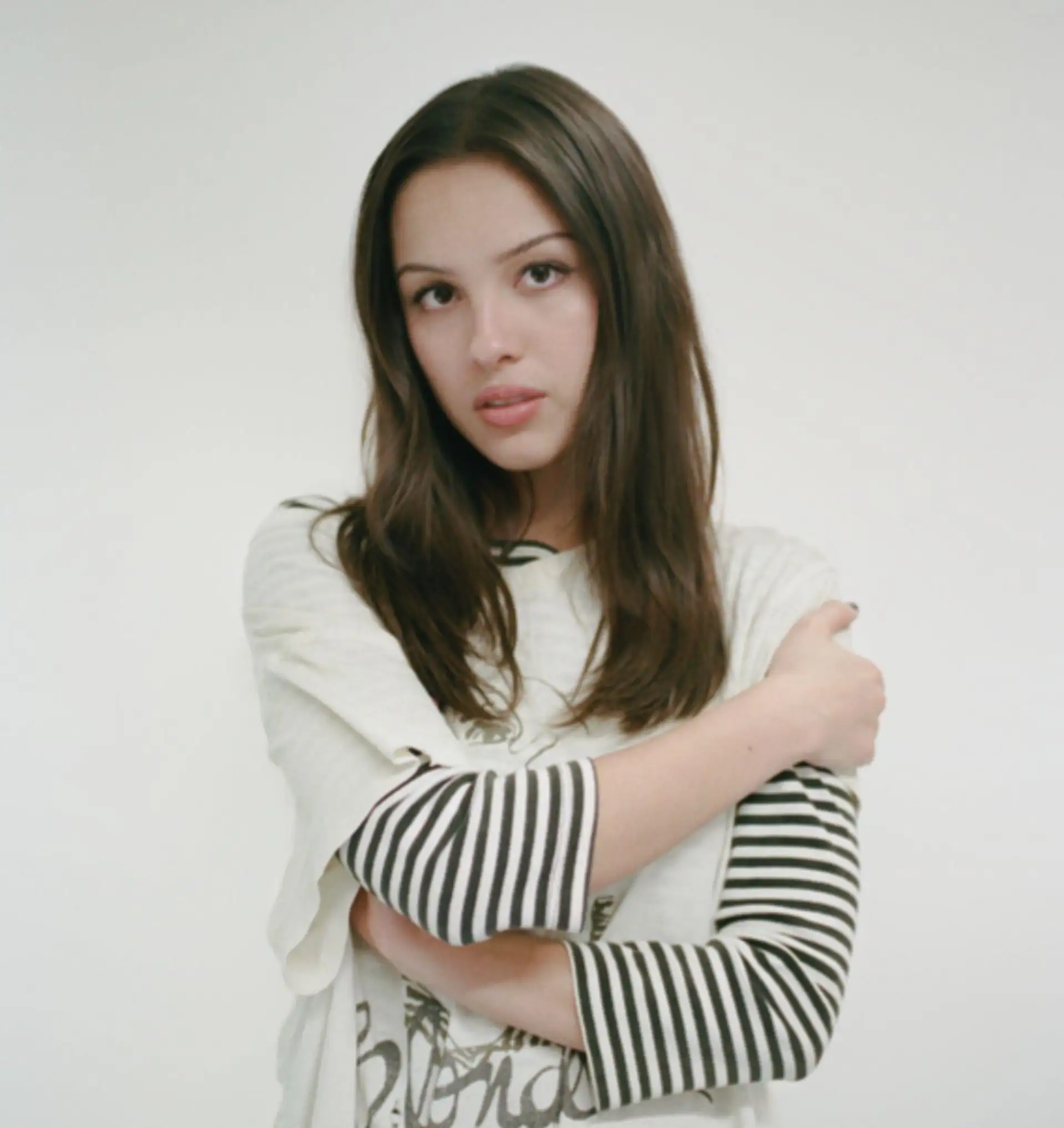 Image of Olivia Rodrigo with striped shirt